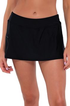 The Sporty Swim Skirt will become one of the most versatile pieces in your swimwear collection. This skirt is ideal for women who want more coverage along with functionality. Featuring hidden attached shorts and a wide waistband, it will keep you comfortable on those busy summer days. Also includes a side zipper pocket and a mid-rise fit. A Skirt for All Day: Wear this full-coverage bottom to the beach and beyond! Find Your Perfect Fit: Available in sizes XS through 16, with plus sizing in solid Fitted Swim Skirt With Built-in Shorts For Pool, Fitted Skirted Swimwear With Built-in Shorts, Black Mini Swim Skirt With Built-in Shorts, Black Summer Swim Skirt With Built-in Shorts, Black Swim Skirt With Built-in Shorts For Vacation, Swim Skirt With Built-in Shorts For Swimming, Solid Color Swim Dress With Built-in Shorts, Beach Season Skirted Bottoms With Built-in Shorts, Skirted Bottoms With Built-in Shorts For Beach Season