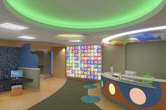 a brightly lit room with colorful tiles on the walls and ceiling, as well as a reception counter