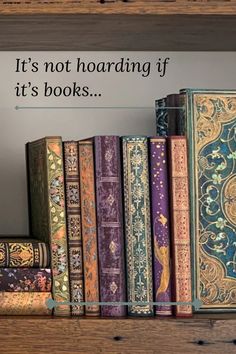 there is a shelf with many books on it and the words, it's not hoarding if it's books