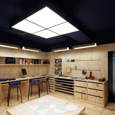 a room that has some tables and chairs in it with shelves on the wall behind them