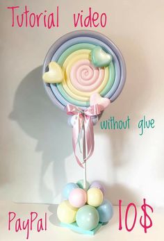 a candy lollipop stand is shown with the words, video without glue $ 10