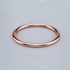 an image of a plain wedding ring on a white background with space for your text