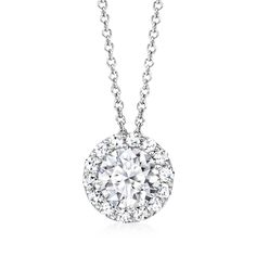 Ross-Simons - 1.00ct t. w. Lab Grown Diamond Halo Pendant Necklace in 14kt White Gold. 18". Set your sights on a dazzling signature style! Our stunning pendant necklace spotlights a .80 carat round brilliant-cut lab-grown diamond with a classic halo of more petite round brilliant-cut lab-grown diamonds totaling .20 carats. Crafted in polished 14kt white gold and suspended from a cable chain with a 2" extender. Lab-grown diamonds are identical to mined diamonds according to their optical, physica Luxury Round Cut Diamond Necklace With Halo Setting, Dazzling Diamond Necklace With Halo Setting, Classic Diamond Necklace With Halo Round Cut, Classic Solitaire Necklace In White Gold With Halo Design, Dazzling Platinum Diamond Necklace With Halo Setting, Classic Halo Solitaire Necklace For Formal Occasions, Platinum Diamond Necklace With Halo Setting And Round Cut, Platinum Diamond Necklace With Halo Setting, Formal Platinum Necklace With Halo Setting