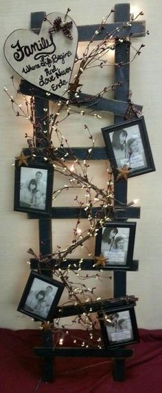 the family tree is decorated with pictures and lights