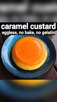 an orange cake on a blue plate with bowls of nuts in the background and text overlay that reads eggless - no bake no gelatin caramel custard