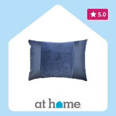 a blue pillow with the words at home on it and an image of a house