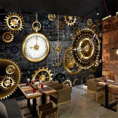 a restaurant with large clocks on the wall and tables in front of it, along with chairs