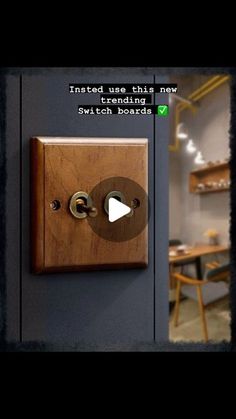 an image of a wooden switch on the wall in a room with shelves and tables