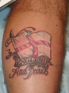 a man with a tattoo on his arm that says english and proud