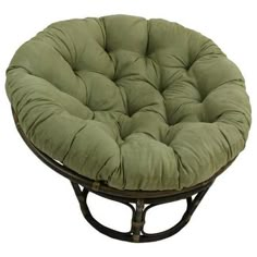 a round chair that is made out of wood and has a green cushion on it