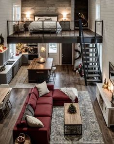 a living room filled with furniture and a loft