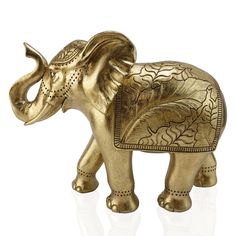 an elephant figurine is shown on a white surface