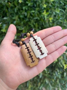 Handmade Razor Blade Shaped Carved Reclaimed Bone Necklace  Made with waxed cotton cord with double sliding knots  to make the necklace adjustable. The pendant and beads are hand made with yak bones.  Unique piece of jewelry to go with boho , hippie, grunge , fairy core or cottage core styles. Pendant is 1.50X1  inches  Necklace length could be from 8"- 16" ( not including the pendant) Great for layering with other necklaces  #recycled jewelry #peace  #handmade #unique necklace #bone jewelry Handmade Edgy Necklaces For Alternative Fashion, Handmade Punk Necklaces For Cosplay, Handmade Punk Necklaces For Alternative Fashion, Double Sliding Knot, Handmade Bone-colored Unique Necklace, Unique Handmade Bone Necklace, Gothic Boho, Hippie Grunge, Punk Necklace