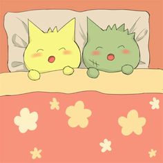 two cats are sleeping in bed together