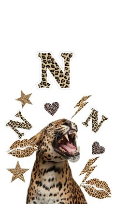 a cheetah with its mouth open in front of stars and the letter n