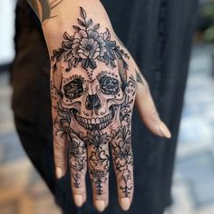 Versatile Skull Hand Tattoo Tattoo Sketches Skull Flower Hand Tattoo, Spooky Hand Tattoos For Women, Skull With Snake And Flowers, Gothic Feminine Tattoos, Tiny Skeleton Tattoo, Skeleton Finger Tattoo, Sugar Skull Tattoos For Women, Goth Hand Tattoos, Candy Skull Tattoo For Men