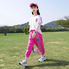 Introducing our Summer Girls Contrast Cartoon Tops and Striped Sweatpants Set, a perfect combination of style and comfort. Made with high-quality cotton and polyester, it's not only fashionable but also suitable for any season. With a regular sleeve style and O-neck collar, it's perfect for girls ages 4-12. Upgrade your little one's wardrobe today. Estimated Delivery: 20 Days-excluding weekends and holidays SPECIFICATIONS Style: Fashion /Sleeve Style: Regular Sleeve Length(cm): Short /Season: An Pink Cotton Playwear Pants, Pink Cotton Pants For Playwear, Sporty Cotton School Sets, Girls Back, Cartoon Tops, Full Length Pants, Striped Sweatpants, Girl's Back, Kids Fashion Clothes