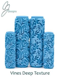 six blue vases with flowers on them are stacked up in the shape of columns