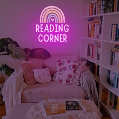 the reading corner is lit up with neon lights and bookshelves in the background