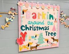 a bulletin board on the wall that says barkin around the christmas tree