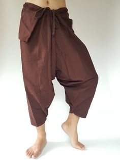 "⬇️ SHOP HERE https://www.etsy.com/ch-en/shop/IndycraftsDesigns Aladdin Pants, Harem Pants 100% Cotton Unisex pants, perfect for yoga, The fabric is cotton soft, lightweight, and airy, ideal for those warm days. If it's a bit chilly, you could always wear leggings underneath. super comfortable cotton pants made of light, comfortable to wear 100% cotton. Cotton is a natural material that wicks moisture to keep you cool, comfy & dry. Floral printed, elastic waistband,medium-weight, Soft and Co Ninja Pants, Samurai Pants, Cotton Harem Pants, Yoga Trousers, Unisex Pants, Travel Pants, Womens Pants, Maternity Pants, Olive Color