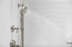 Enjoy luxurious showering combined with up to 30 percent water savings. This 1.75-gpm Bancroft handshower provides three distinct sprays - full coverage, pulsating massage, or silk spray - all enhanced with Katalyst technology for a completely indulgent showering experience. By infusing two liters of air per minute, Katalyst delivers a powerful, voluptuous spray that clings to the body with larger, fuller water drops. KOHLER Bancroft 3-Settings Vibrant Brushed Nickel Handheld Shower Head 1.75 GP Kohler Bancroft, Cottage Bath, Kohler Purist, Wall Mount Faucet Bathroom, Luxurious Showers, Handheld Shower Head, Spray Pattern, Hand Held Shower, Wall Patterns