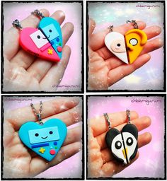 four different colored heart shaped keychains with faces on them, one being a bird and the other is a penguin