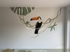 there is a bird painted on the wall