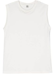 white organic cotton lightweight jersey ribbed trim crew neck sleeveless straight hem This item is made from at least 50% organic materials. Learn more about what makes a product Conscious on our Conscious Criteria page Men's Journal, Wedding Guest Looks, Organic Materials, Louis Vuitton Shoulder Bag, Cotton Tank Top, White Tank Top, Cami Tanks, Luxury Items, Clothes For Sale