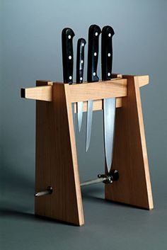 a knife holder with knives in it