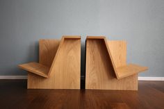 two wooden shelves sitting on top of a hard wood floor