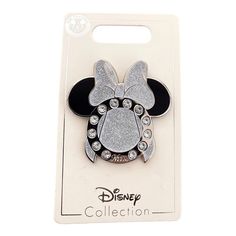 the disney mouse pin has been designed with swarong and sparkles on it