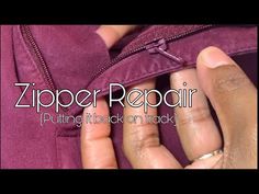 the zipper repair logo is shown in front of a person's hand holding an item