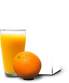 an orange sitting next to a glass of orange juice on a white surface with a square object in the foreground