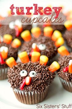 cupcakes with chocolate frosting decorated like turkey heads and candy candies on top