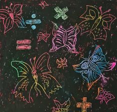 the chalk drawing is colorful and has flowers on it