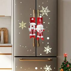 a refrigerator with christmas decorations on it