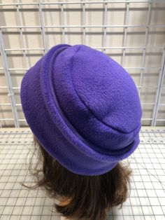 I made this warm pillbox style hat out of purple plum fleece for warmth and comfort. The stand and top are a double layer of fleece. It's sized to fit most adults 21.5-23 inches around head. It has a nice stretchy feel and is completely machine washable and dryable. Fleece Hat Pattern, Fleece Sewing Projects, Winter Fur Hat, Sewing Hats, Fleece Hats, Purple Fleece, Girls Fur, Sewing Fleece, Hat Patterns To Sew