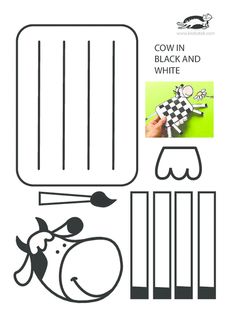 the cow in black and white paper cutout is ready to be used for crafts