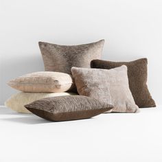 four pillows stacked on top of each other