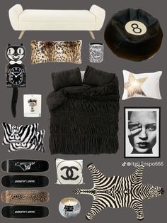 there are many items that can be found in this room, including a couch and zebra print pillows