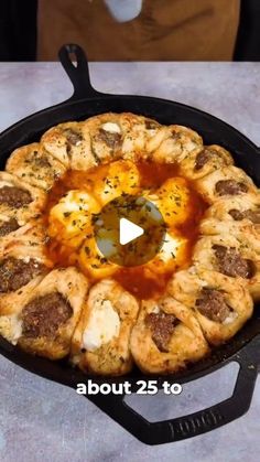 a pan filled with food sitting on top of a table