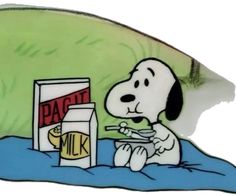 a cartoon dog is eating milk from a carton