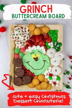 the grinch buttercream board is made with cookies and candy