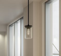 The 1 light Crosby mini pendant with Black finish and clear glass uses 100 watt (max.) bulb equivalent. It measures 6" in width and 10.75" body height. For maximum versatility, it comes with 68" of extra lead wire for customizable length and height and has a 90 degree stem tilt. Cleaning instructions: turn off electric current before cleaning. Clean metal components with a soft cloth moistened with a mild liquid soap solution. Wipe clean and buff with a very soft dry cloth. Under no circumstance Cylinder Pendant Light, Clean Metal, Hanging Pendant Light, Glass Cylinder, How To Clean Metal, Black Pendant Light, Black Pendant, Hanging Pendant Lights, Lighting Ceiling