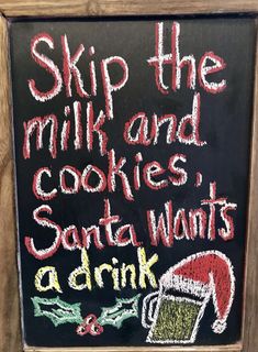 a chalkboard sign that says, skip the milk and cookies santa wants a drink