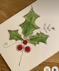 a christmas card with holly leaves and berries on it, which is drawn in watercolor