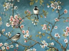 two birds are sitting on the branch of a blossoming tree