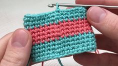 someone is crocheting the stitchs together to make a small piece of fabric