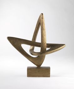 an abstract sculpture is shown on a white background